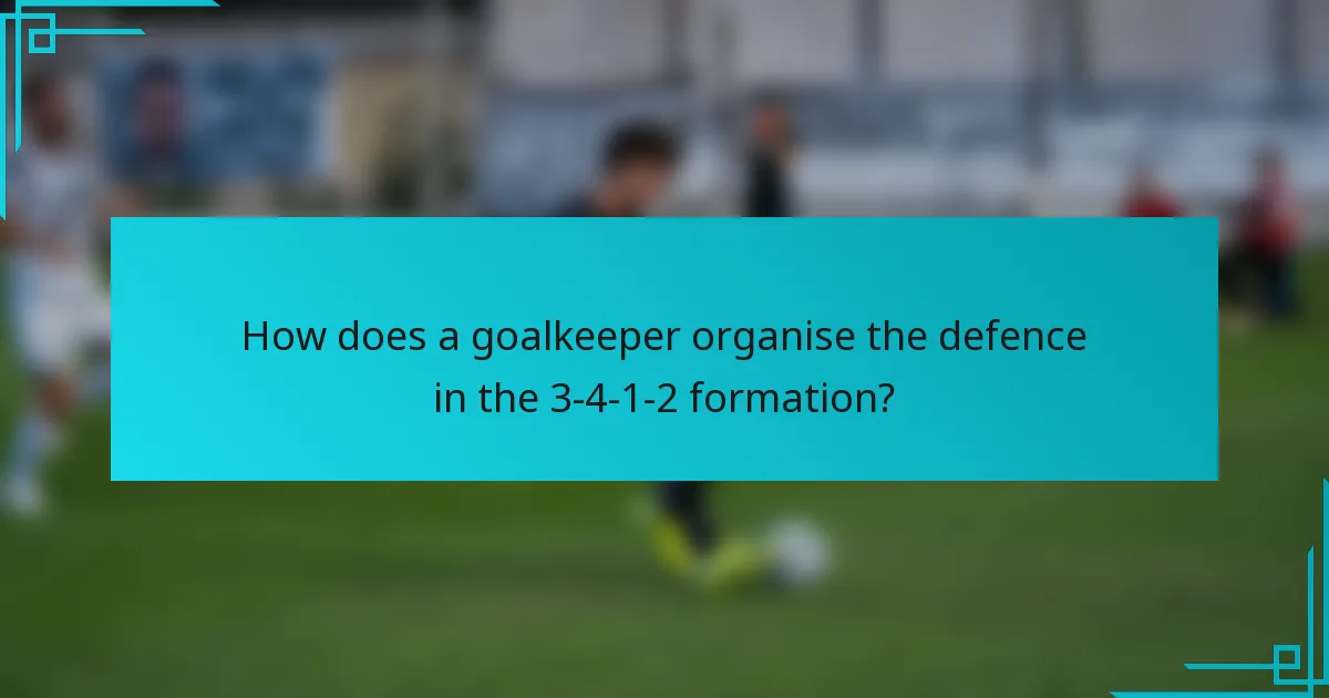 How does a goalkeeper organise the defence in the 3-4-1-2 formation?