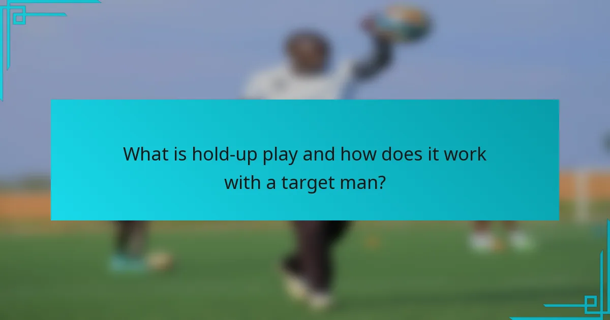 What is hold-up play and how does it work with a target man?